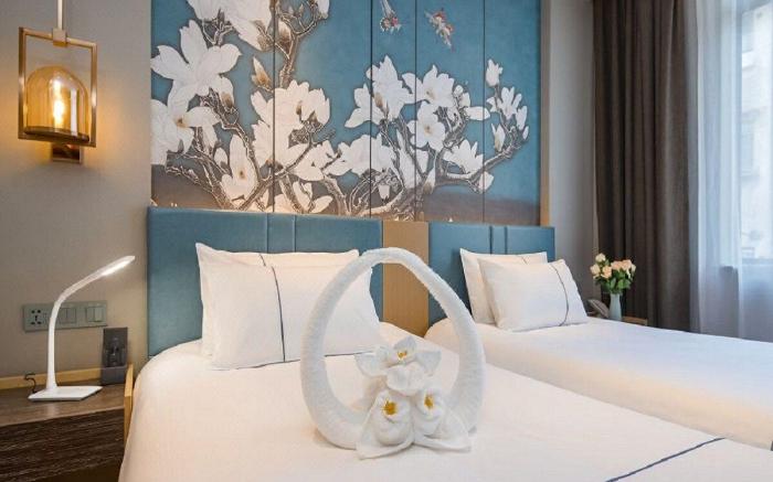 Magnotel Zhengzhou Gaoxin Zhenghonghui Information Engineering University Yulan Street Flagship