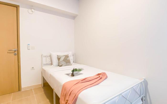 Enjoy Living 2BR at Meikarta Apartment By Travelio