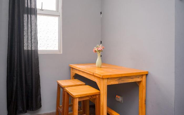 Minimalist Studio Room Urbantown Apt By Travelio