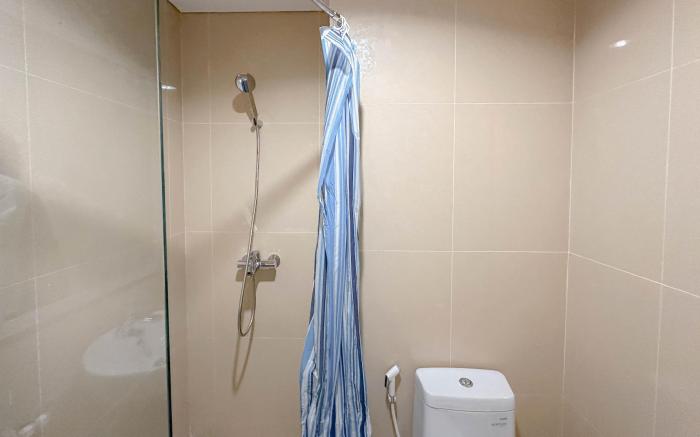 Modern Suite 1BR Grand Sungkono Lagoon By Travelio