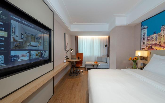 Vienna International Hotel Guangdong Zhaoqing Jinli New Era Plaza