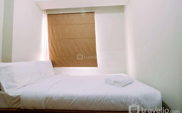 Homey 2BR at Menteng Square Apartment By Travelio