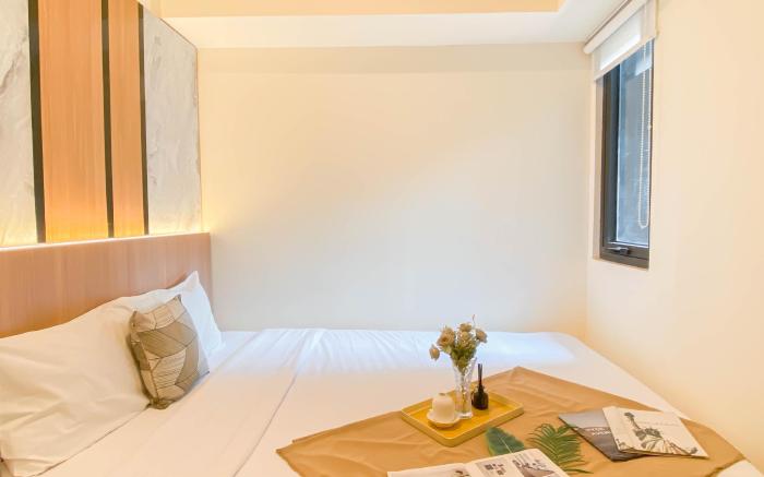 Homey and Modern 2BR at Meikarta Apt By Travelio