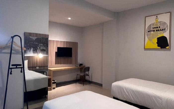 Darmo Inn By News Hotel 
