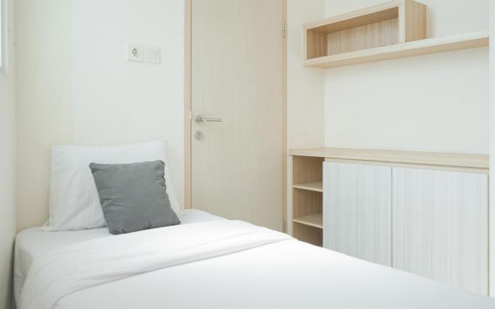 Modern Look 2BR Apt Tree Park City BSD By Travelio