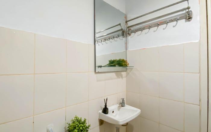 Cozy 2BR at Bogor Valley Apartment By Travelio