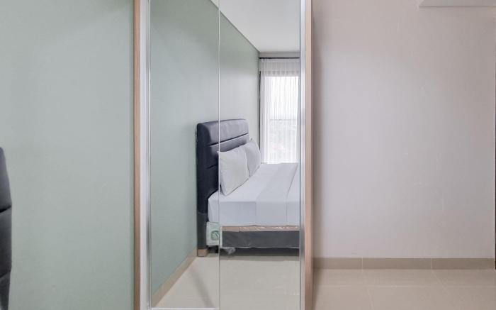 Simply Look 1BR Apt Patraland Amarta By Travelio