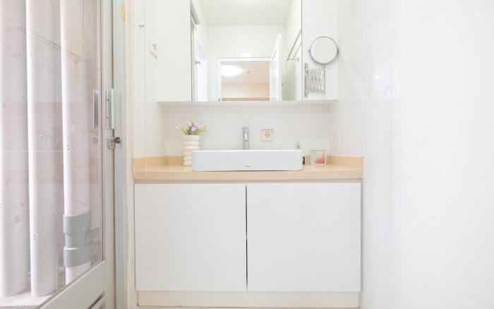 Combined 1BR at Green Bay Pluit Apt By Travelio
