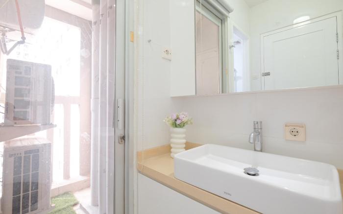 Combined 1BR at Green Bay Pluit Apt By Travelio