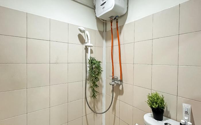 Neat Studio Room at Tifolia Apartment By Travelio