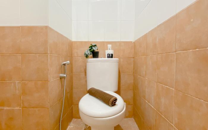 Compact 2BR Apt at Green Pramuka City By Travelio