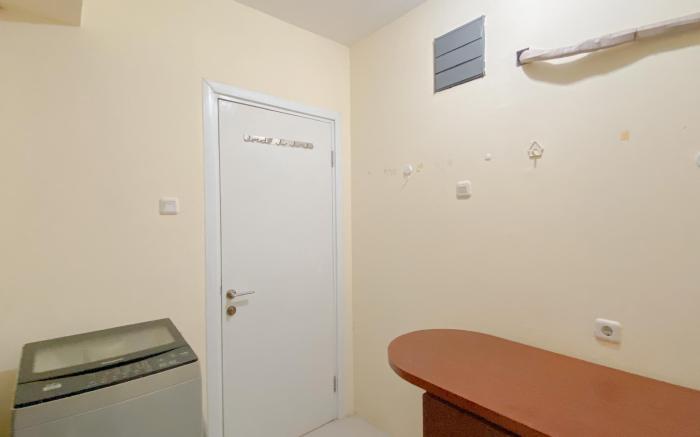 Combined 1BR Apt at Green Pramuka City By Travelio