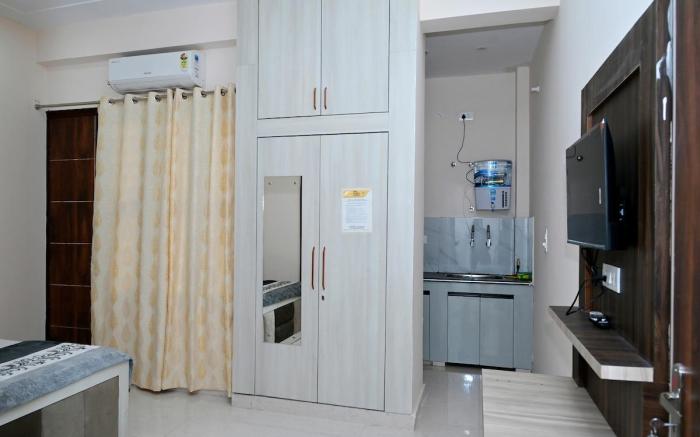 Maa Ganga Homes |Room No 203(No unmarried couples)