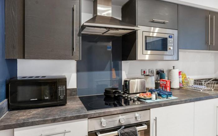 Spacious 4BR Home in Wigan | Garden & Parking