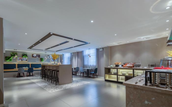 Home Inn Haiyang Xinyuan Plaza Commercial Center