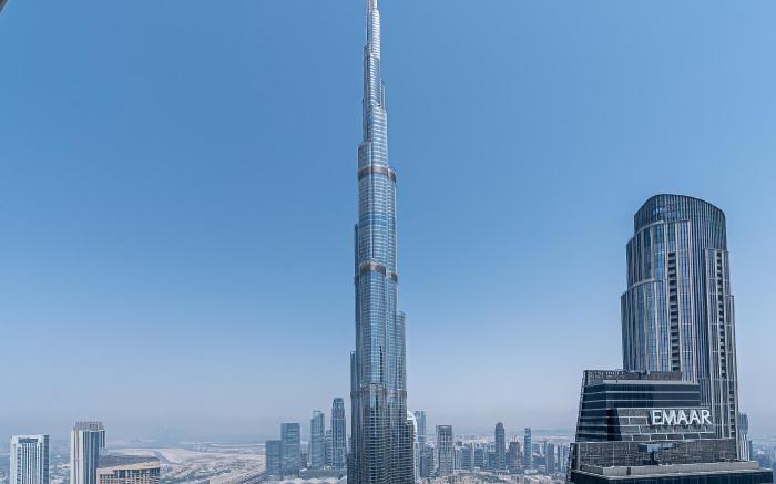 Elegant 4BR High-Rise Overlooking Burj Khalifa & Fountains