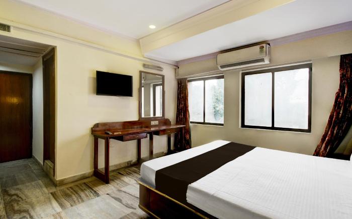SPOT ON Surya Luxury Rooms