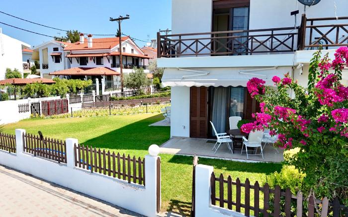 Beachfront Bliss in Nikiti, Spacious 2 Story Villa with Stunning Sea Views