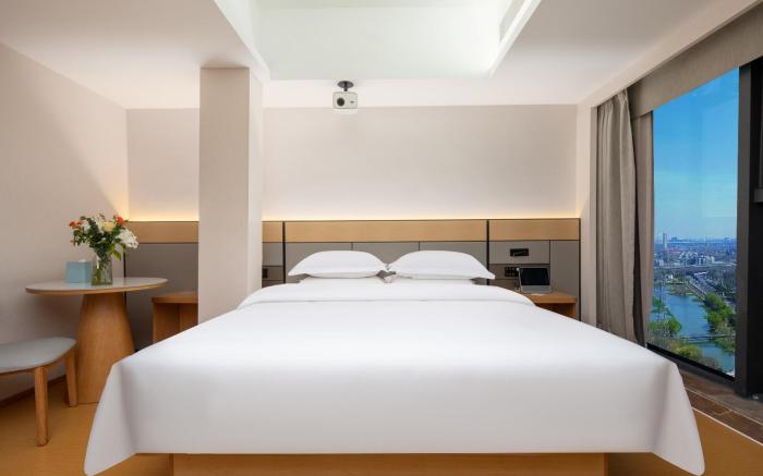 Echarm Hotel Wuhan High-speed Railway Station Happy Valley