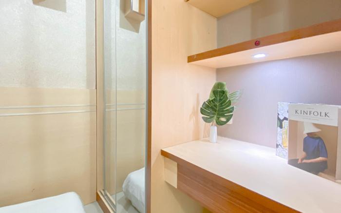 Simple Style 2BR at Green Pramuka City By Travelio