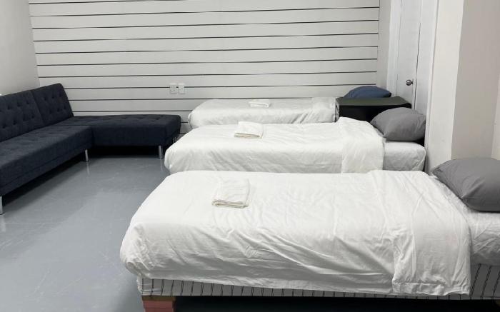 Three single bed and 2 sofa beds Studio, Suite 7
