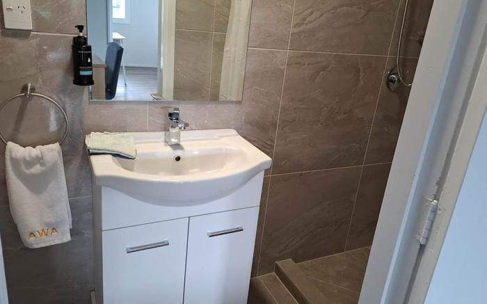 Three Double, 4 Single, 2 Sofa Bed, Suite 1