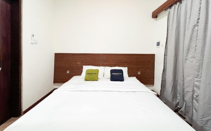 Urbanview Hotel Arta Guna Casa