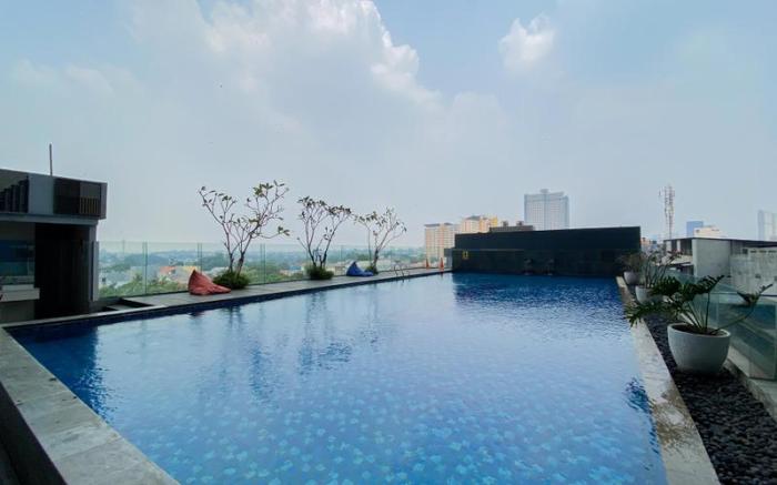 Simple Studio at Apt Evenciio Margonda By Travelio