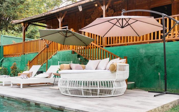 Jungle Wooden House By The River in Ubud