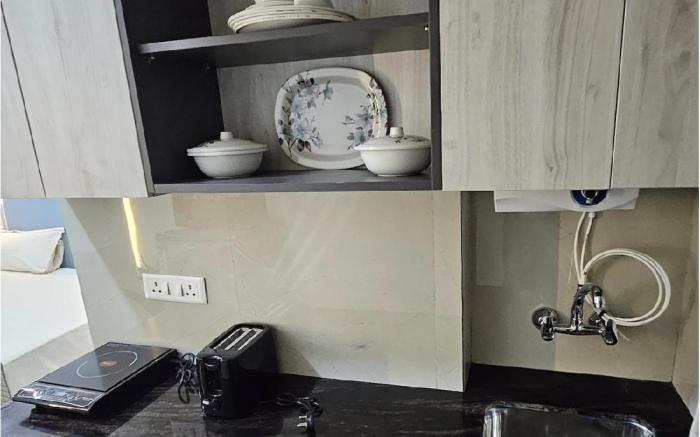 Modern Studio with Kitchenette & Cozy Seating