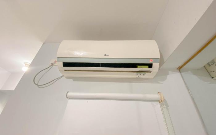 Basic Studio at Candiland Apartment By Travelio