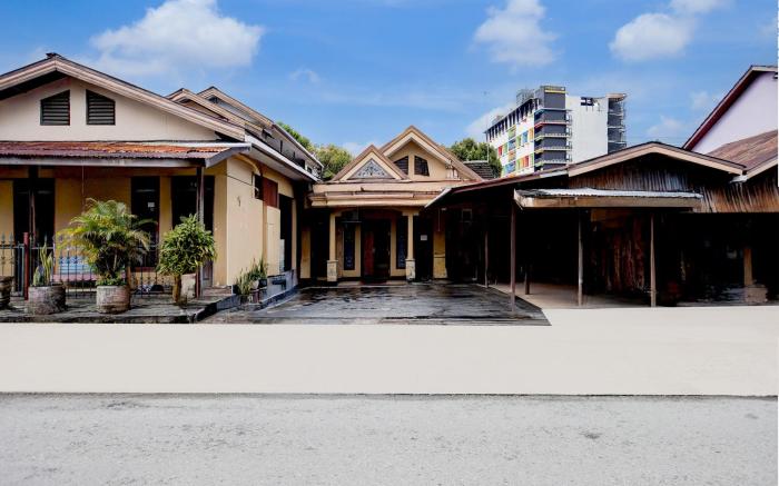 OYO 94775 Palm Cafe Inn