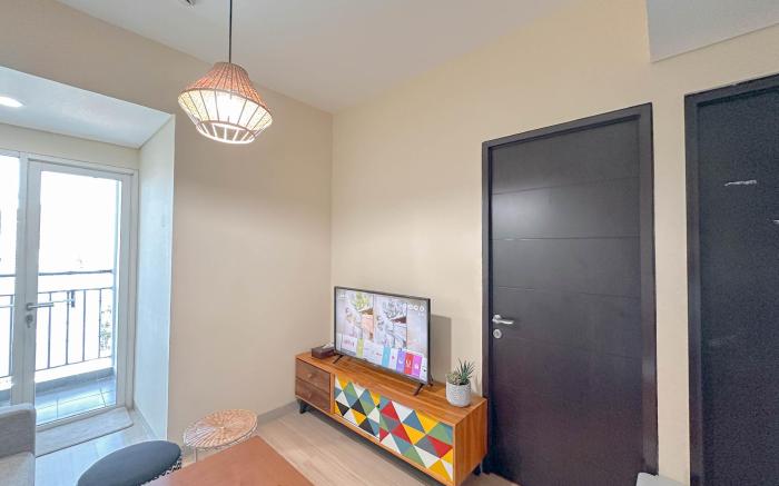 1BR near UINSA at Tamansari Papilio By Travelio