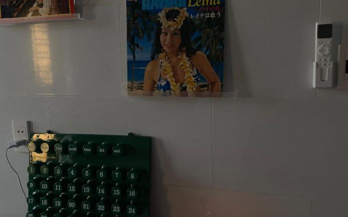 Balcony view room with vinyl record machine.