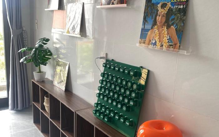 Balcony view room with vinyl record machine.