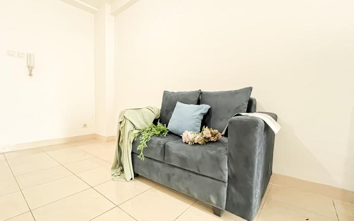 Basic 2BR Apartment at Green Bay Pluit By Travelio