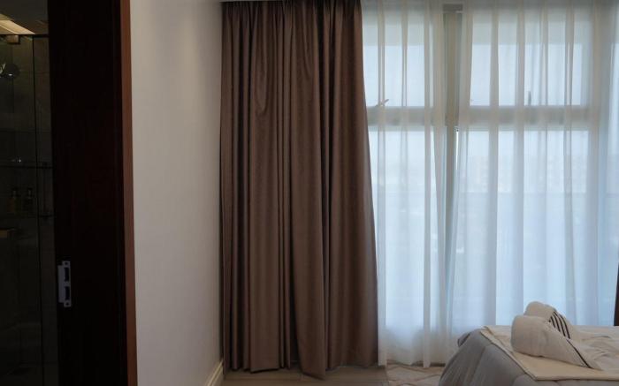 Modern 2BR Condo with Infinity Pool & Gym