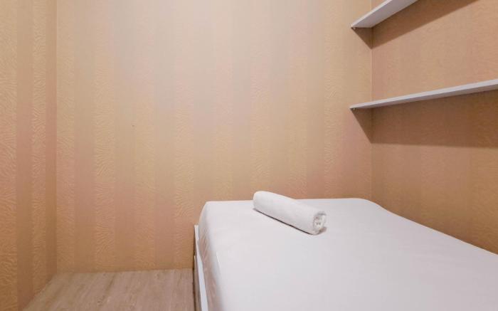 Wooden Accent 2BR at Mekarwangi Square By Travelio