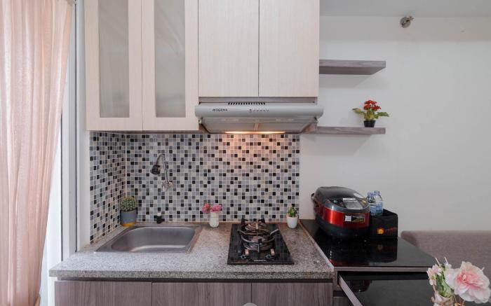 Strategic 2BR Apt Green Pramuka City By Travelio