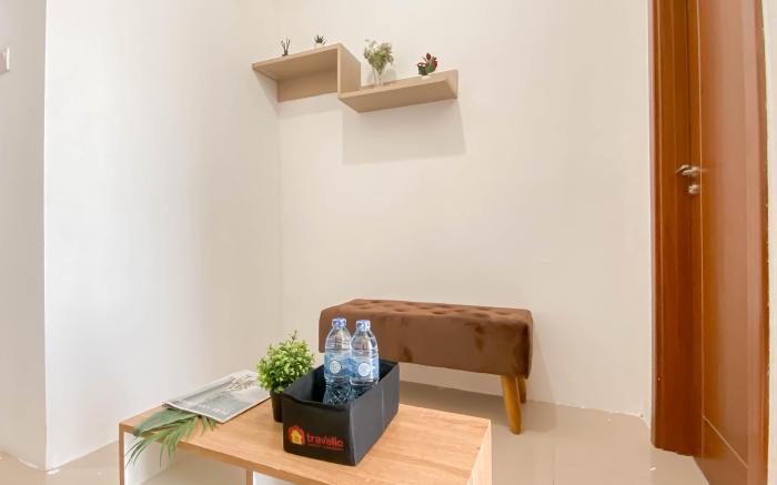 Basic 1BR Apartment Vittoria Residence By Travelio