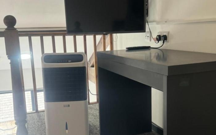 Kick back relax stylish space with balcony