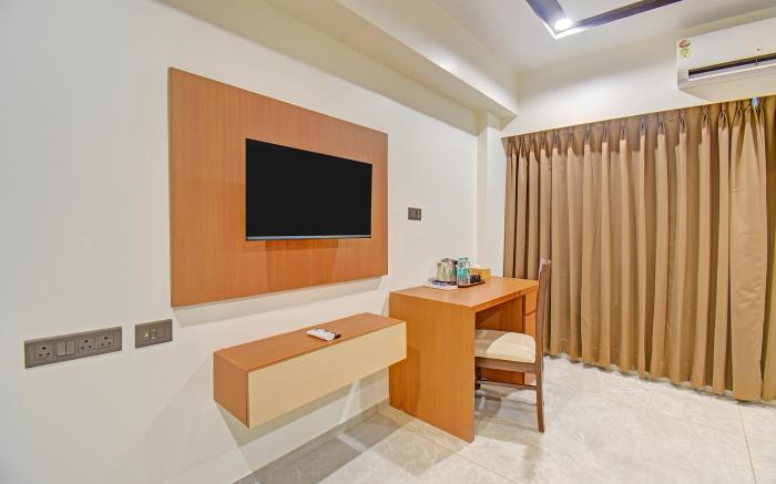 FabHotel New Moshi Grrand