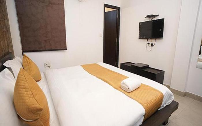 FabHotel Golden Palm