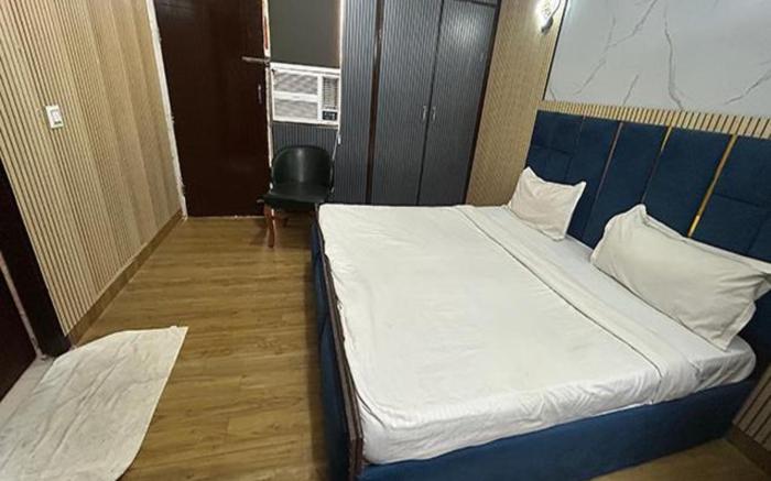 FabHotel Happy Residency