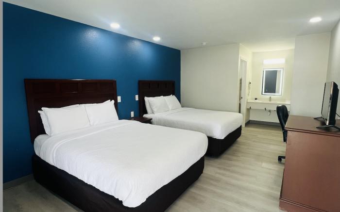 The Hallmark Inn & Suites Newly Renovated Rooms 