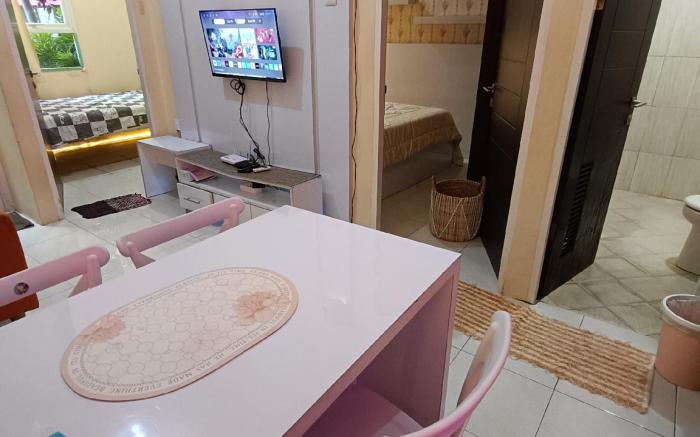 Malioboro City Apartment Family Room by Liliput