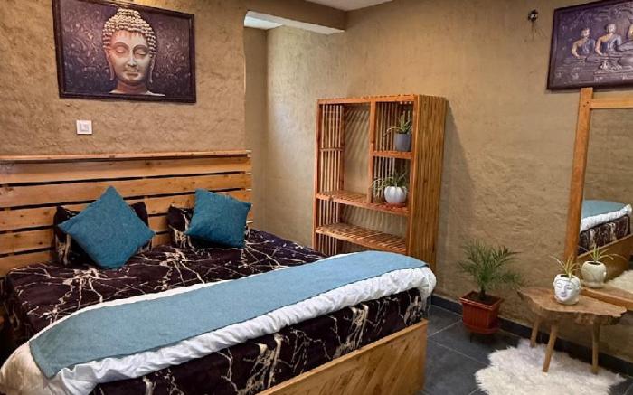 Mudhouse room with valley view