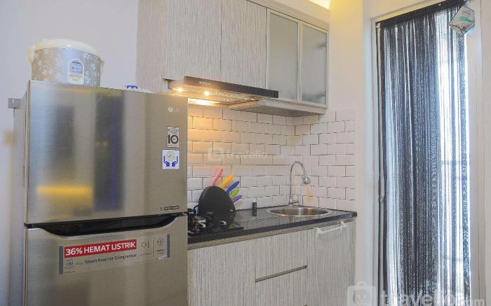Pool View 2BR Bassura City Apartment By Travelio