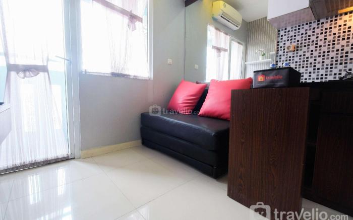 Homey 2BR Green Pramuka Apartment By Travelio