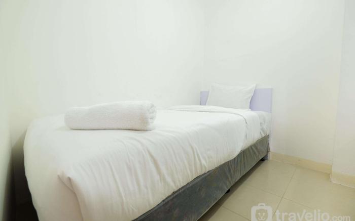 Simply Living 2BR at Bassura City Apt By Travelio